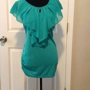 Sleeveless green top